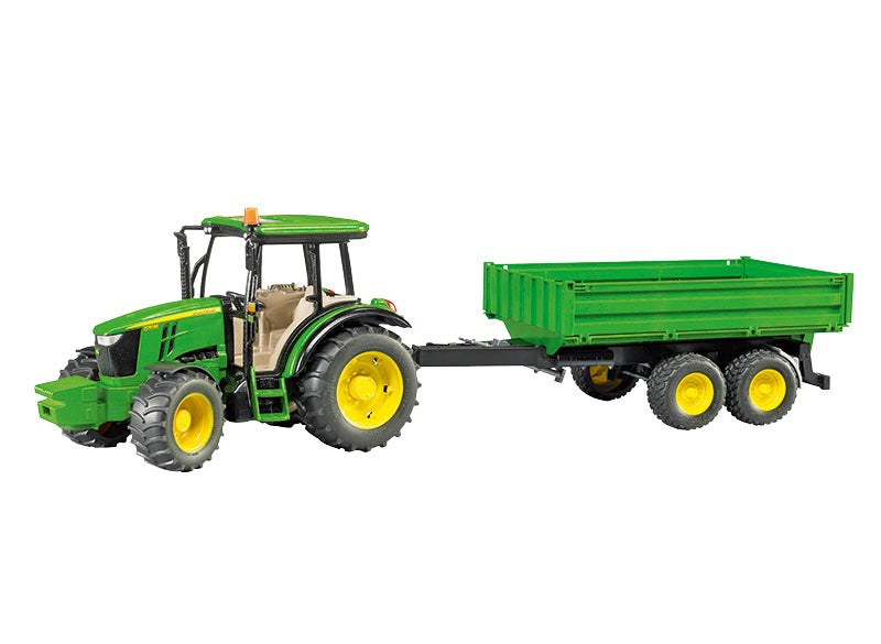 The John Deere 5115M toy tractor with tipping trailer in classic John Deere green