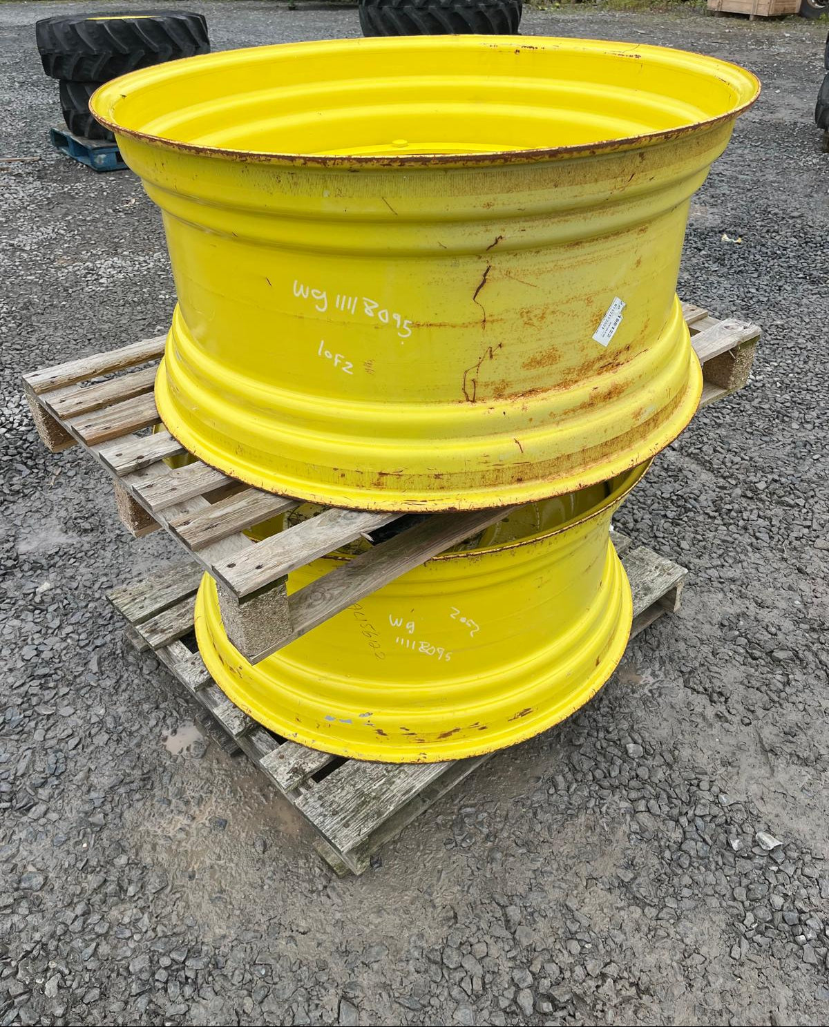 Used Pair of 18x38 John Deere Adjustable Ring Wheels