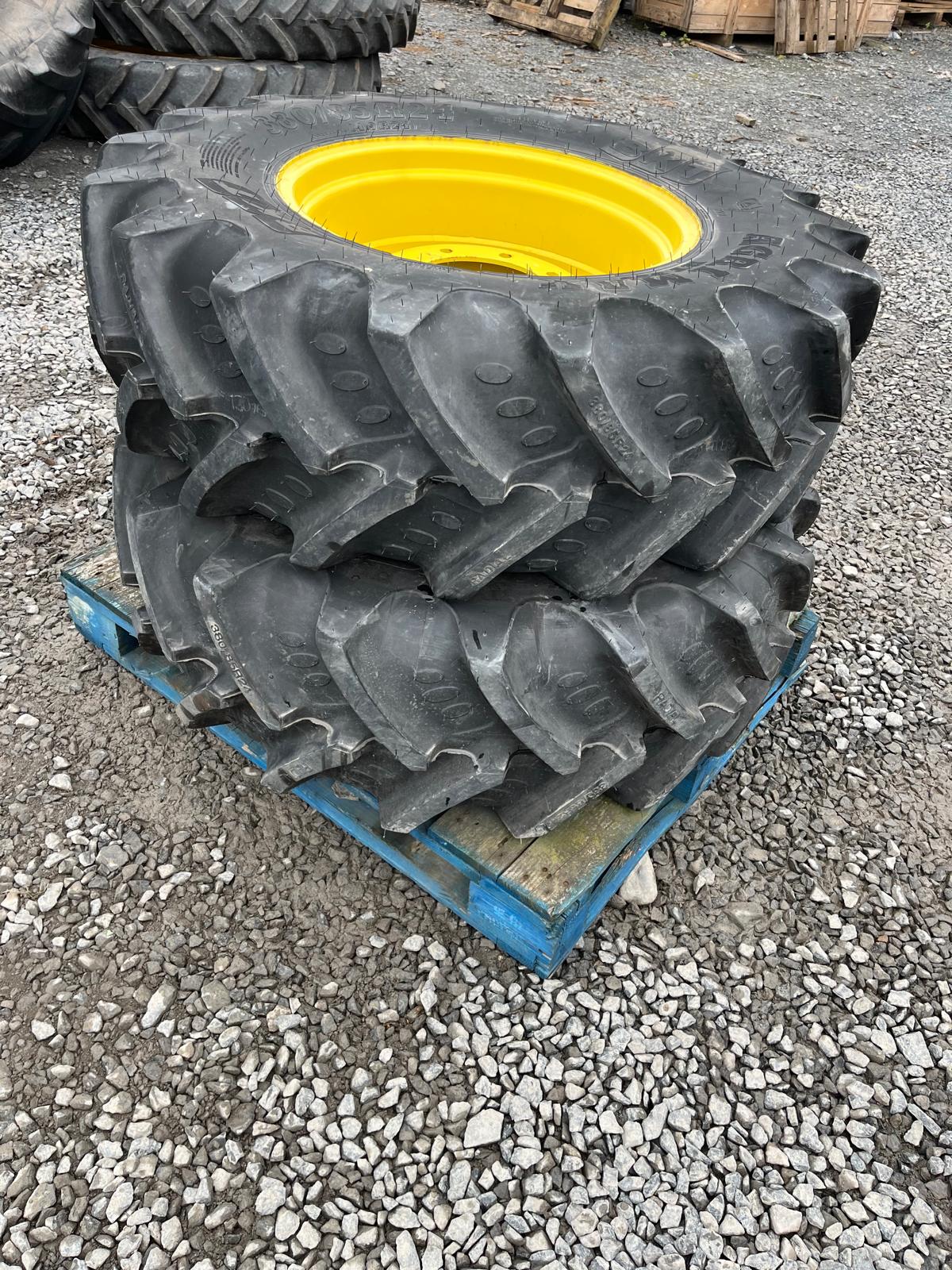 Used 12x24 John Deere Adjustable Wheel Rims with BKT 382/85R24