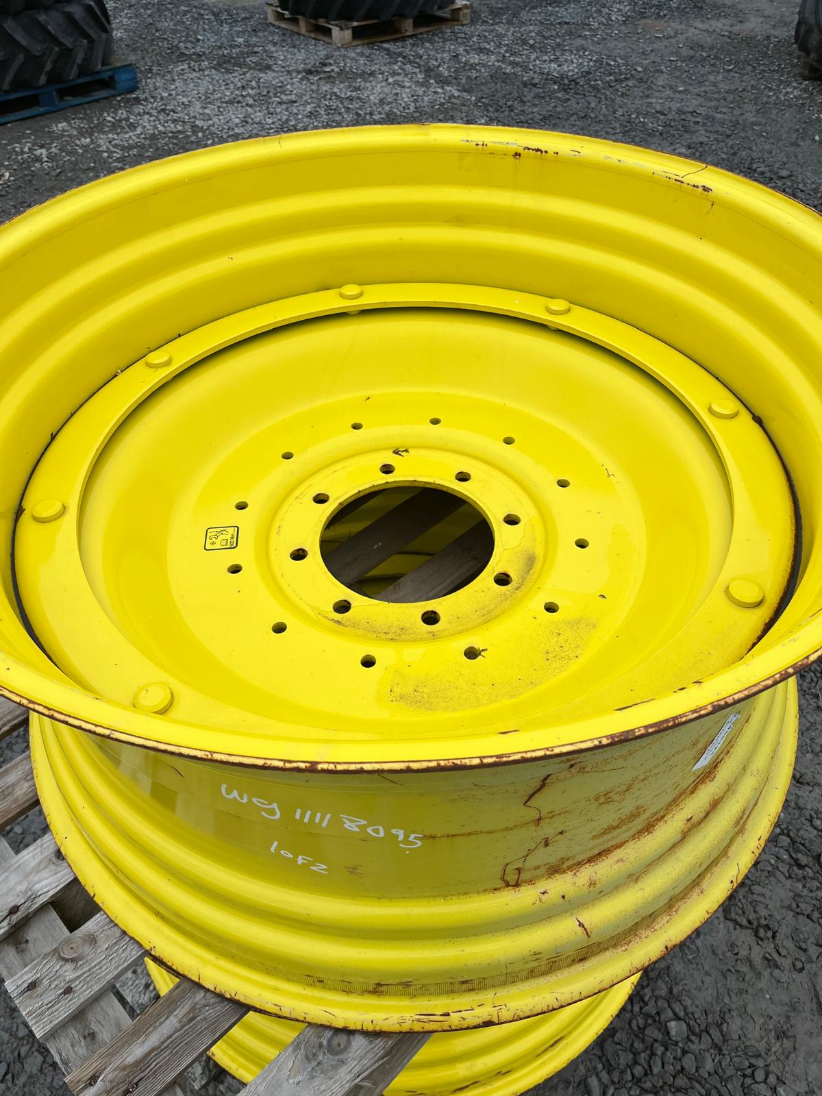 Used Pair of 18x38 John Deere Adjustable Ring Wheels