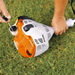 A close up image of someone starting up the STIHL FS 40 Strimmer on the ground