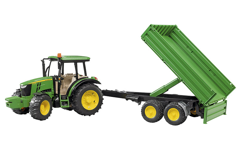 The John Deere 5115M toy tractor with tipping trailer in classic John Deere green