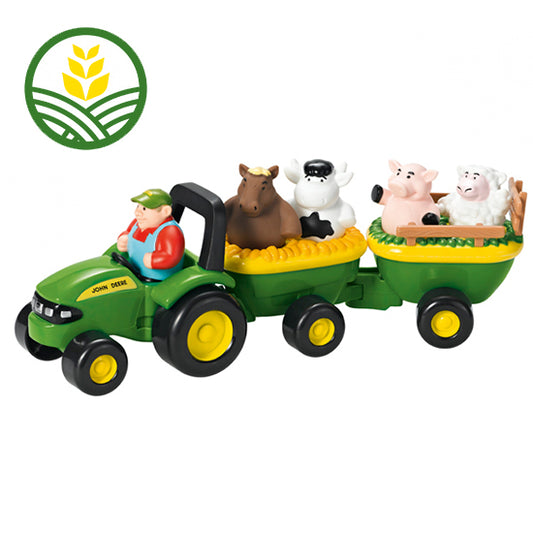 John Deere Toy tractor and trailer with farmer and farm animals.