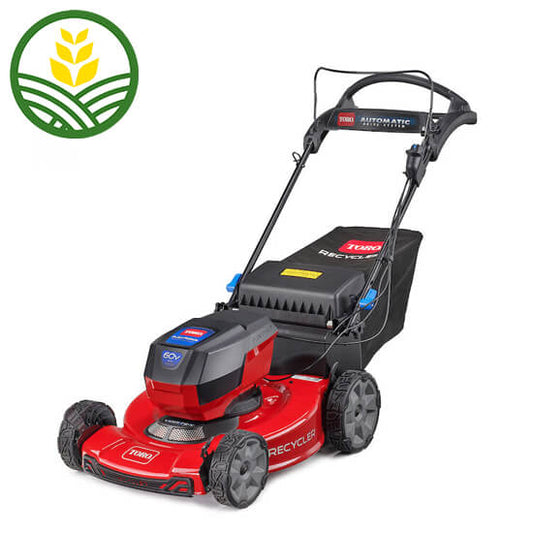 Toro push mower. Red metal work with a black grass collector and handle. 4 wheels and the battery is positioned on top of the 55cm deck.