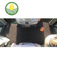 A brown carpet tractor cab floor mat with the cornthwaite group logo embroidered in the corner