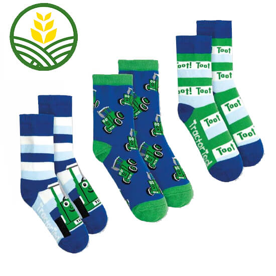 3 sets of kids green blue and white socks with Tractor Ted patterns.
