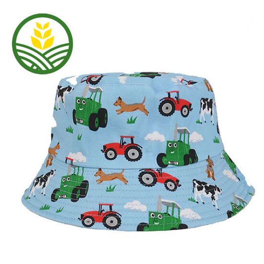 Blue Kids Bucket Hat with Tractor Ted, cows, tractors and dogs all over hat.