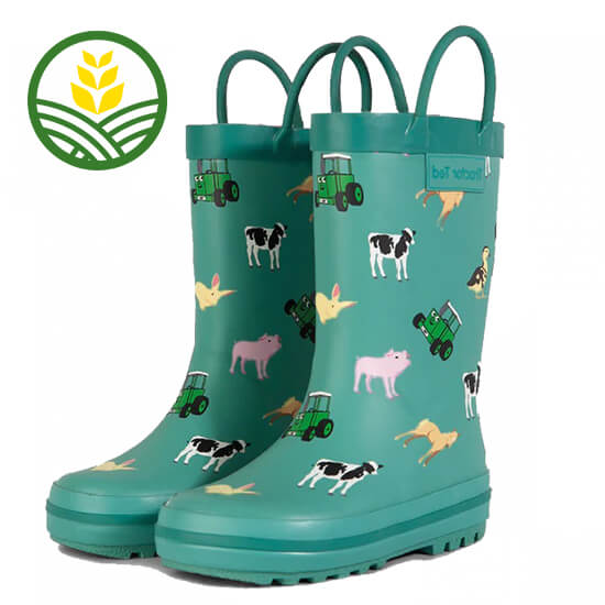Teal kids wellies with Tractor Ted and farmyard animals.